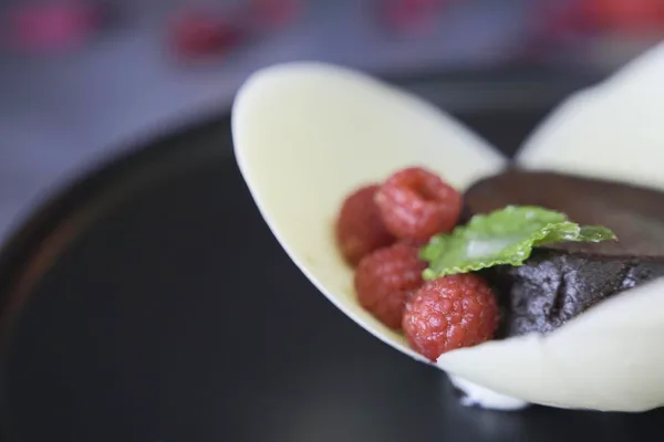 Chocolate Petit Gâteau, White Chocolate Cup, Cocoa Crumble, Macerated Raspberries